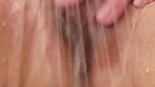 A housewife gets filmed taking a shower and shaving her