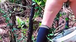 Peeing on a Toilet in the Woods
