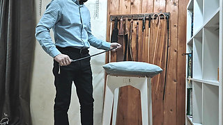 Strict Flogging of the Wife with a Cane and a Belt on the Bare Ass