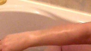 Washing Soapy Breasts in Bath