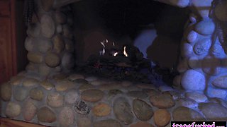 Cozy sex by the fire with exciting shemale