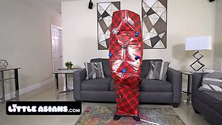 Cute Little Asian Girls Unwrap Their Male Sex Doll