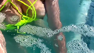 Artemisia Love flashing her juicy big tits underwater for you wearing a sexy bikini