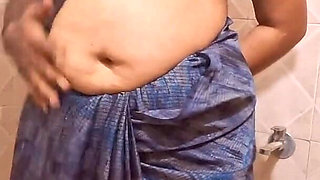 Aunty Bathing in Saree with Husband