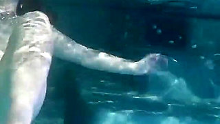 Sunny Lane sucks cock underwater