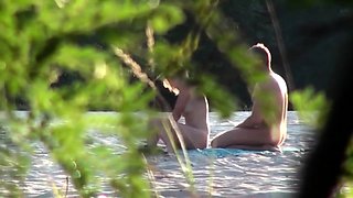 Voyeur captures amateur couple having sex on the beach
