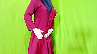 Arabian woman enjoying taking off all her clothes