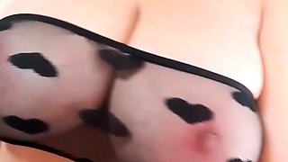 Brunette seductress working her big boobs and hot ass