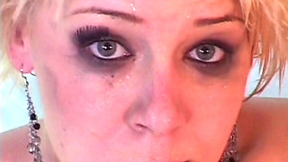 Blonde French whore gets sprayed with piss in lesbian action