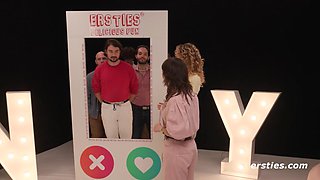 Blonde with pierced nipples kisses then takes doggy on a real life sex game show