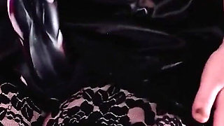 Sexy Mistress Teasing by Big Dildo Strap-on... and Wearing Black Nylon Stockings