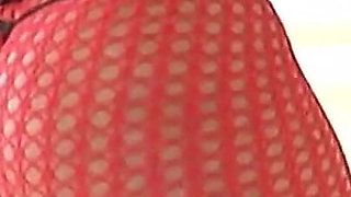 Blacl and Busty Slut with Colored Hair and Fishnet Stockings Gets Fucked by a Big Black Cock
