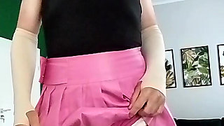 Cock Protrudes from Pink Mini Skirt