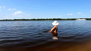 Blonde Solo Nudist Shows Off Tattoos by the River