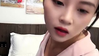 Horny Japanese teen in school uniform sucks cock