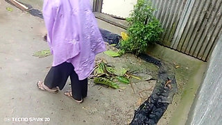 Girl Sweeping the Yard Naked in the Rain - Outdoor Scene