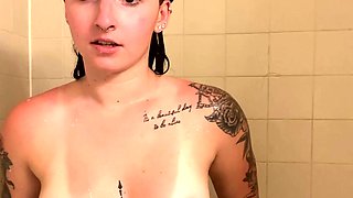 Busty babe playing with her big boobs