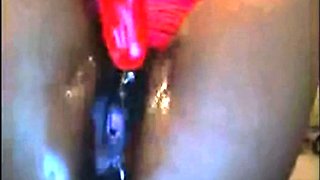 Ebony Squirts with Dildo on Webcam