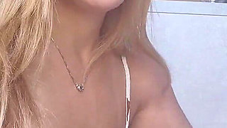 Naughty Blonde Showing off on the Balcony