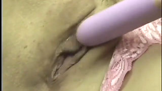Trampy young brunette Nevaeh Ashton holds vibrator to her clit then shoves it in her shaved cunt