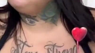 Sucking on His Lollipop and Smoking