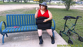 Nurse Vicki Smoking in the Park on a Bench All Dressed up