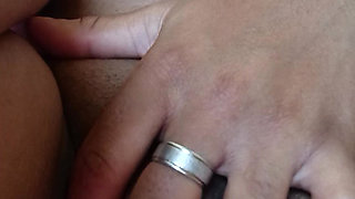 Wet brunette masturbating