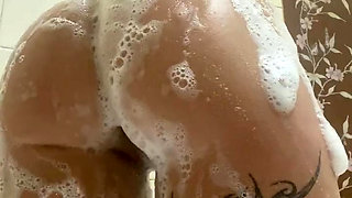 the dirty slut washed her sweet lustful body in foam in the shower and spread her ass