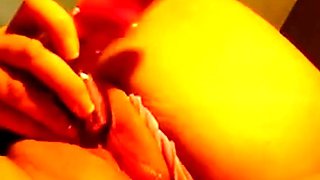 Webcam girl uses sex toy on her wet puffy pussy.