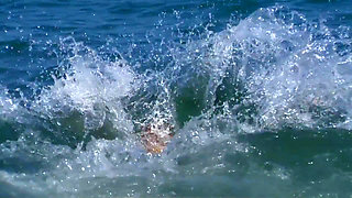 When the blonde is on a beach she gets really horny and looks for something to fuck