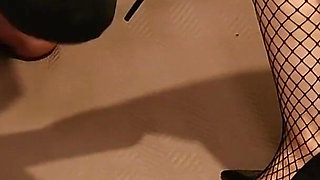 Ballbusting in fishnet stockings