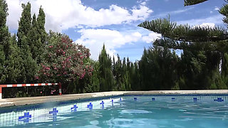 Brunette babe with nice tits is pissing by the pool