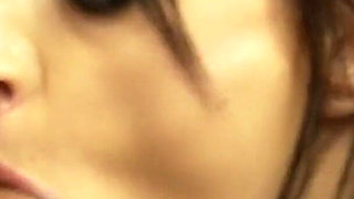 Dirty brunette in fishnets gets banged by a dick through a glory hole after sucking it