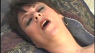 Gorgeous mature brunette enjoys a huge pole sink into her tight pussy in bed
