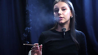 Young Girl Smoking Solo in a Calm Studio Session with Slow Exhales