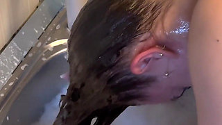 Hair Wash with Dishwasher Liquid in Kitchen Sink