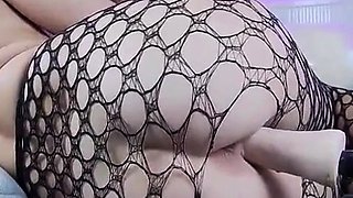 Big-Titted Blonde Rides Her Fuck Machine