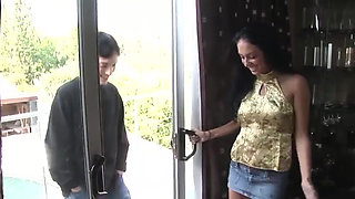 Brunette teen gives handjob in soap and oil