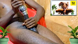 Enjoying fuck with water bottle while watching porn movie, The way I enjoyed it was like I was fucking real hot pussy!