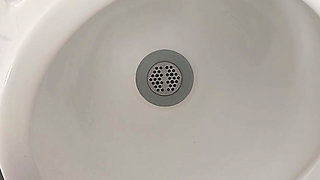 Moaning daddy has a lot of pressure and milks his cock in the public toilet