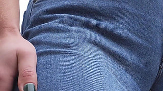MILF Teasing Her Big Cameltoe in Blue Jeans Outdoors