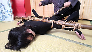 Xr40-a Girl in Black Stocking Is Tied to a Cross