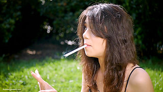 Arina Is Smoking 120mm Cigarettes Outdoors