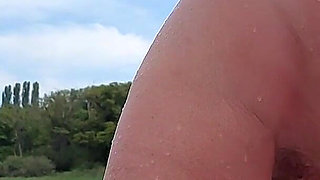 Sexy Granny Swims Naked in a Lake!