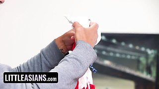 Maid kneels under wooden desk