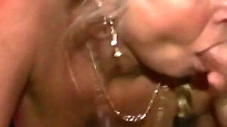 Blonde milf with horny big tits penetrated by two cocks