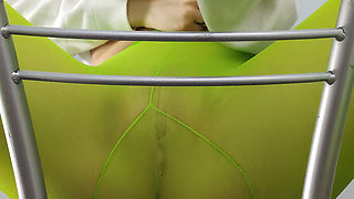 Redhead Teen Feeling Horny in Green Tights on Chair