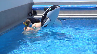 Lesbian Girls Are Having Fun in a Pool with an Inflatable Shark