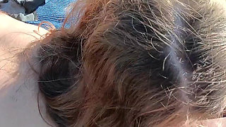 stepdaughter blows stepfather on a nudist beach