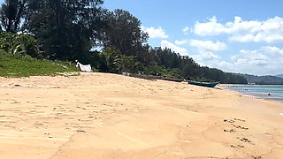Teasing in Red Bikini on the Beach